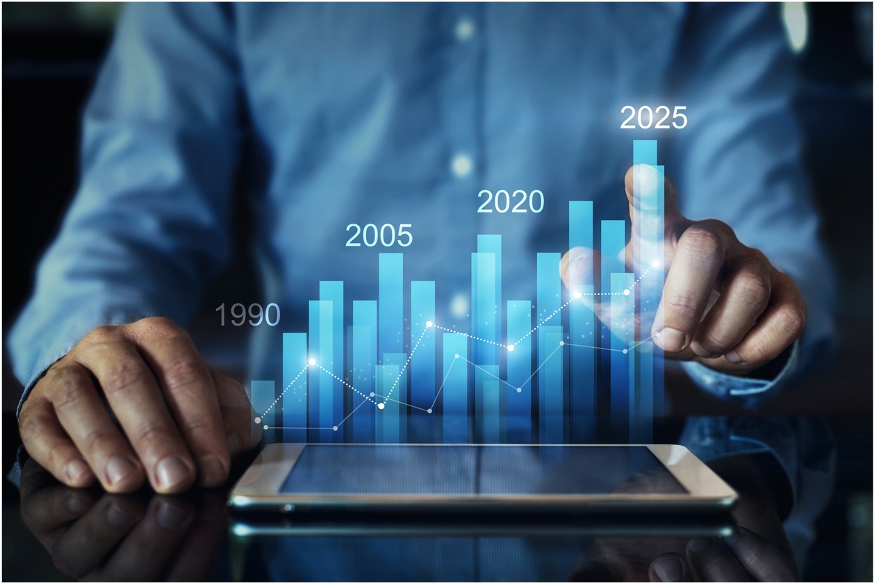 Man looks at chart increasing over time on ipad